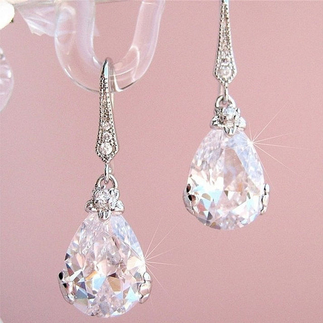 Elegant Pearl Shaped Dangling Earrings - BritishElegance