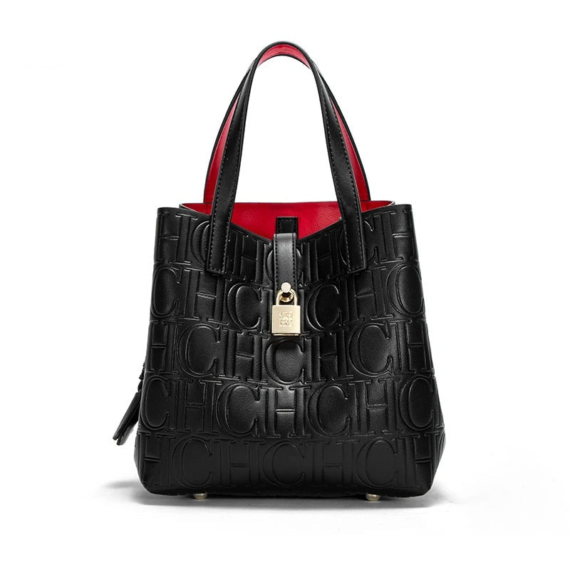 Elegant Black Tote Handbag with Red Interior - VogeLuxe