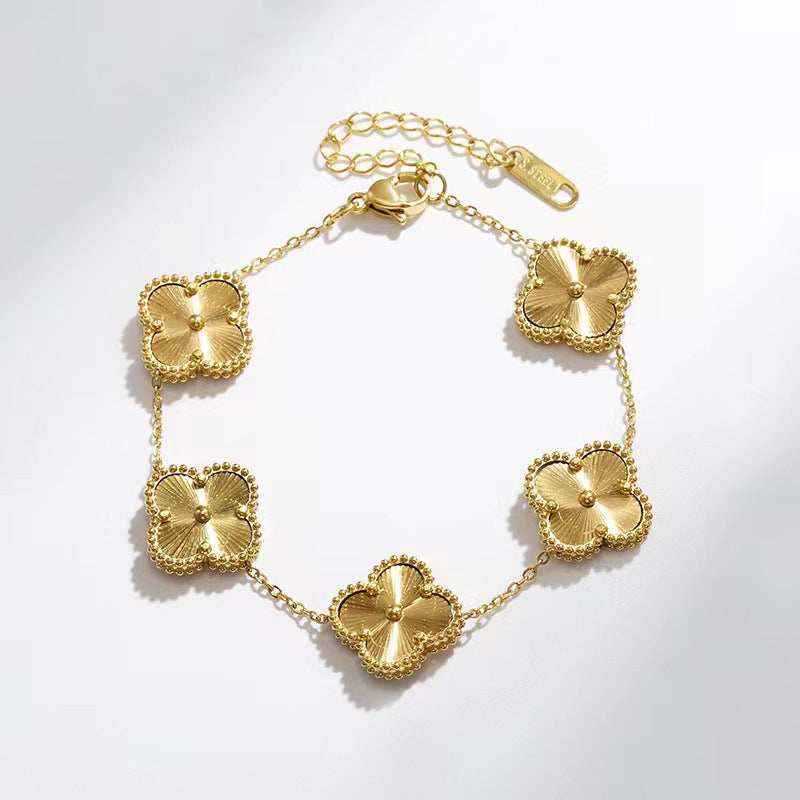 Delicate Flower Charm Gold Plated Ladies Bracelet - VogeLuxe